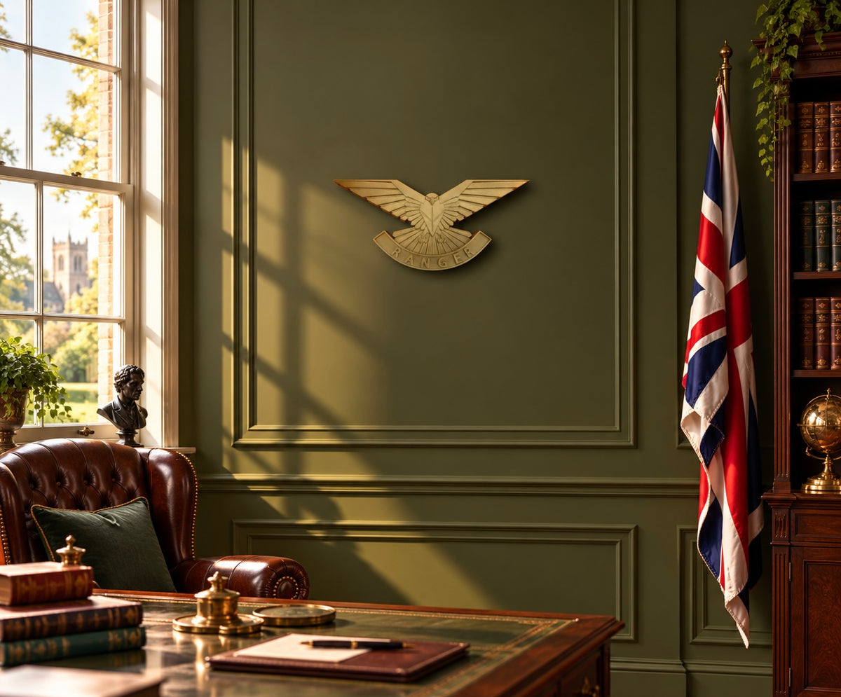 Ranger Regiment cap badge wall display above a desk in a traditional British study with olive-green walls