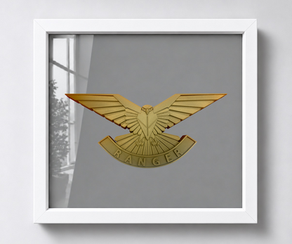 Ranger Regiment cap badge in a white shadow-box frame, showing the falcon and RANGER scroll against grey backing