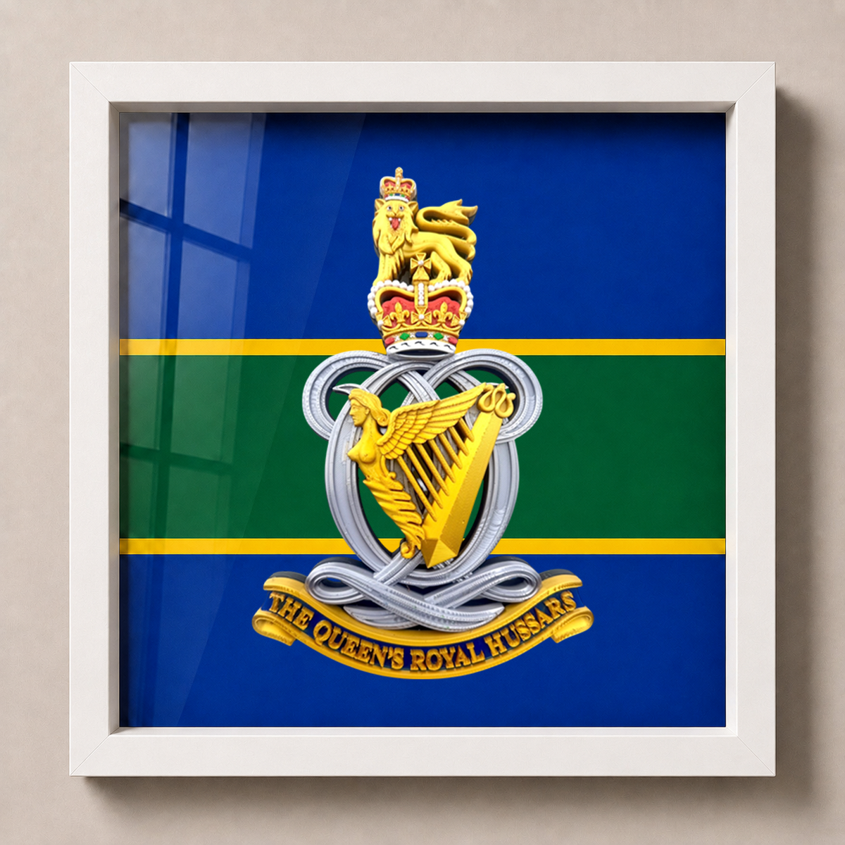 Close-up of Queen’s Royal Hussars Queen’s Crown cap badge in a hand-finished display frame