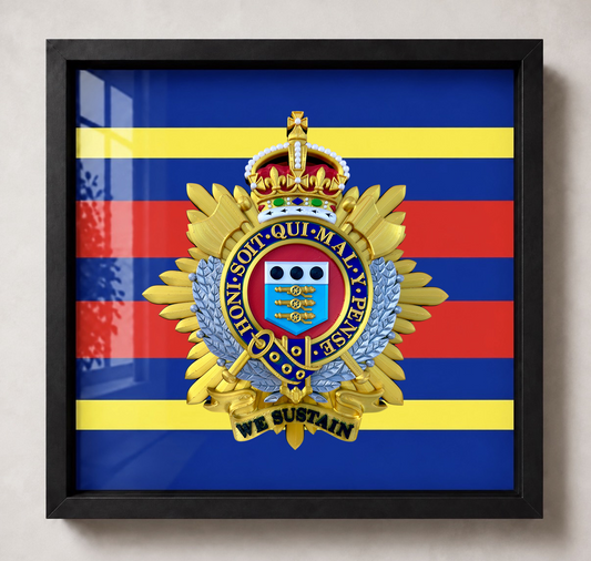 Royal Logistic Corps King's Crown cap badge in a black display frame with blue, red and yellow striped backing