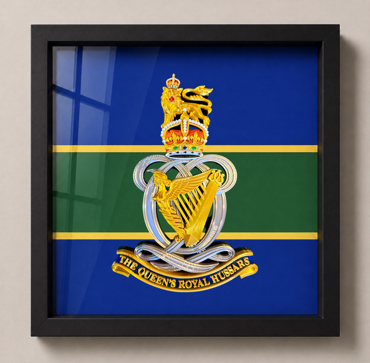 Queen’s Royal Hussars King’s Crown cap badge display frame showing the framed badge and regimental-coloured backing