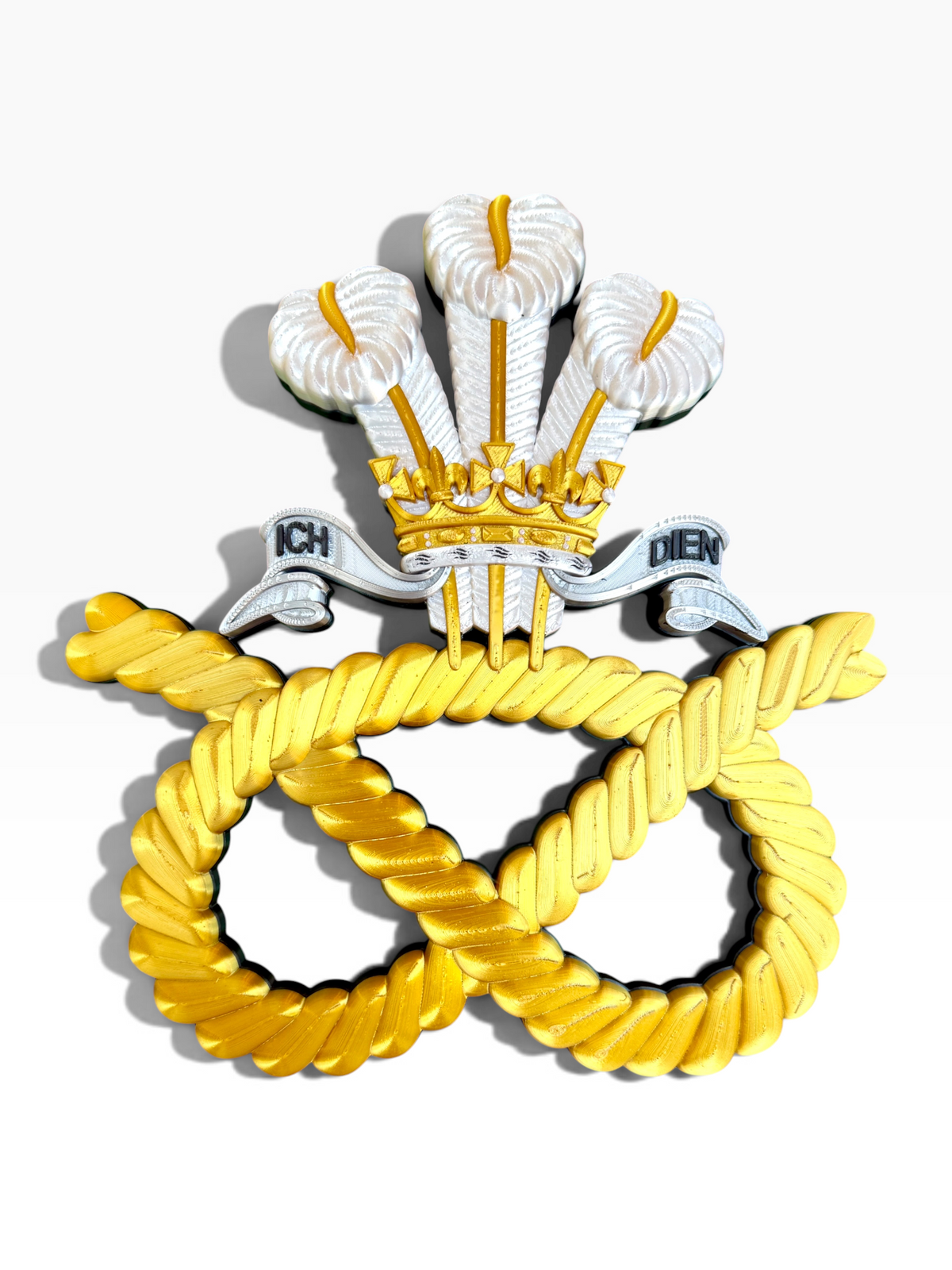Staffordshire Regiment cap badge display with Staffordshire Knot, coronet and ICH DIEN scroll