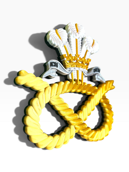 Staffordshire Regiment cap badge display featuring the Prince of Wales's feathers and ICH DIEN motto