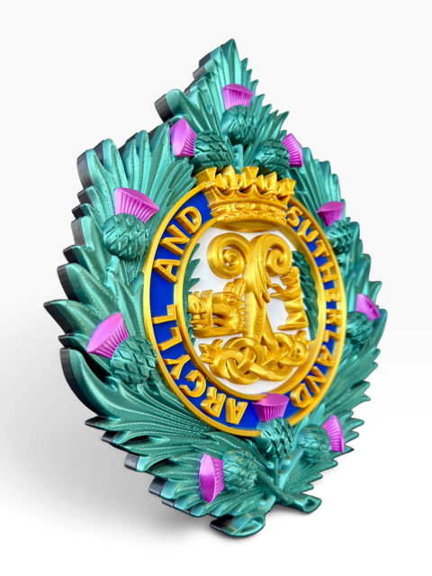 Argyll and Sutherland Highlanders cap badge in green, purple, blue, gold and silver tones