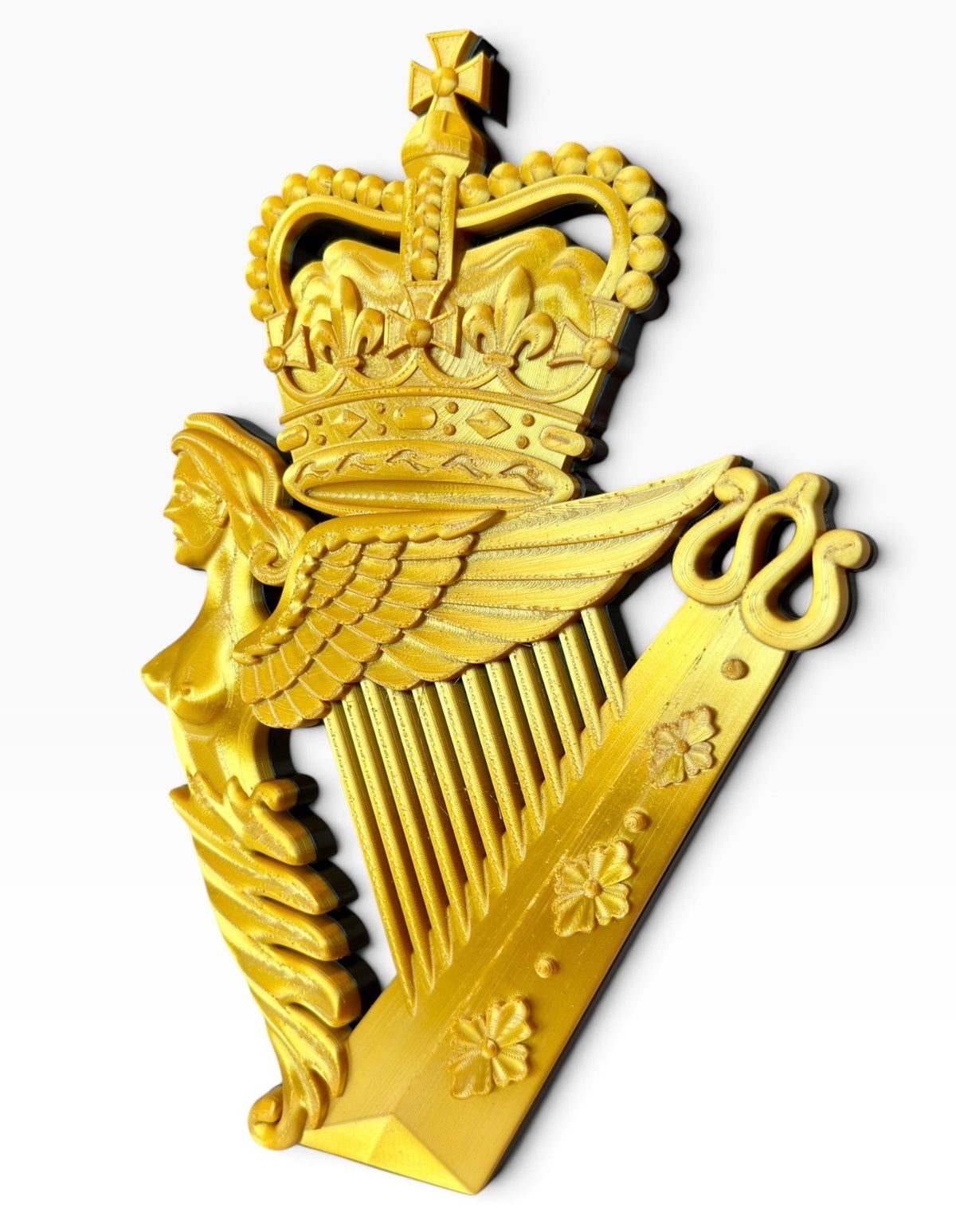 Ulster Defence Regiment badge – close view of the harp, crown and sculpted surface detail