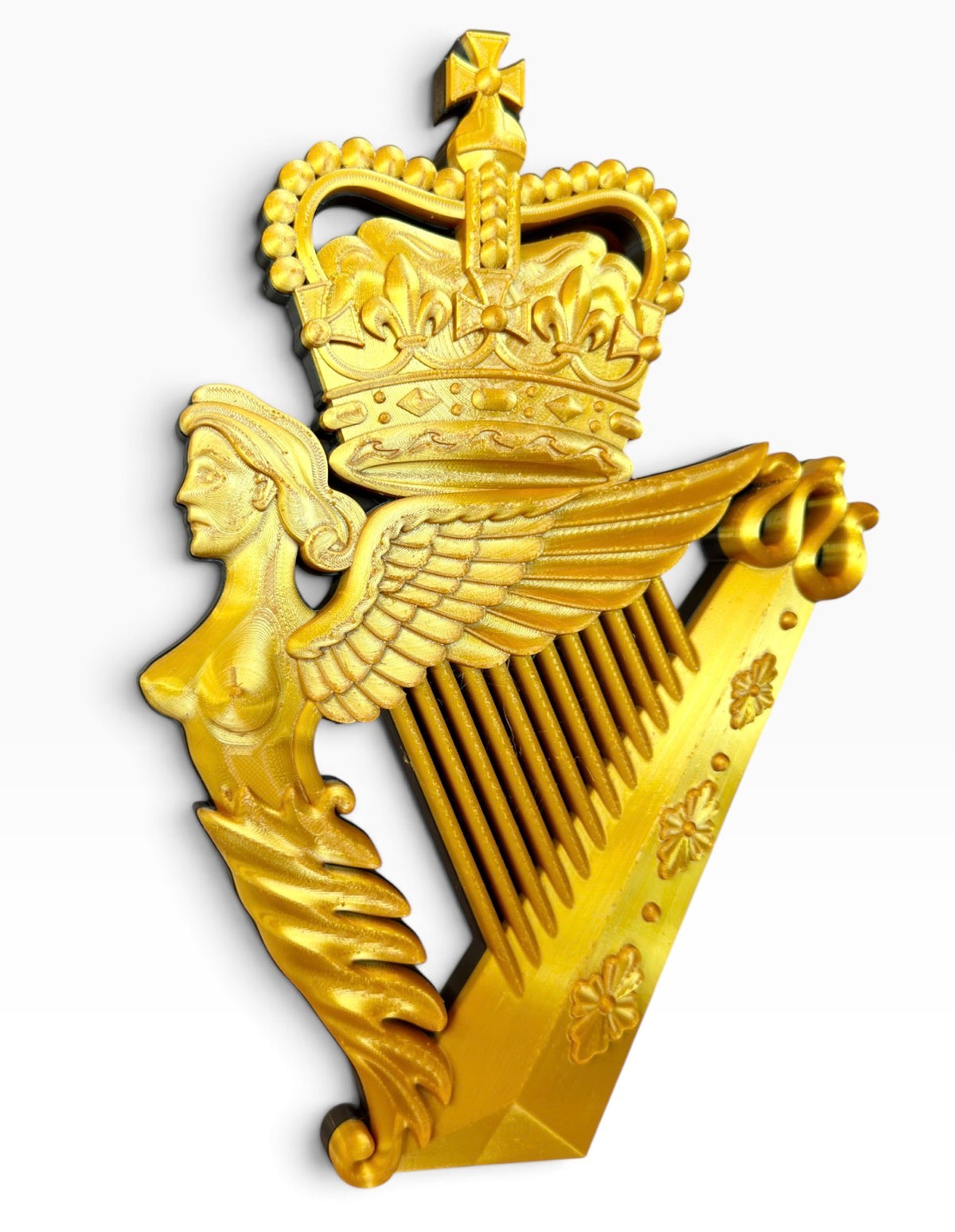 UDR cap badge – angled view showing the crowned Irish harp and raised 3D detail