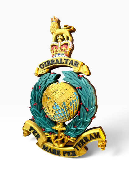 Royal Marines Queen's Crown badge featuring the globe, laurel wreath and gold relief details