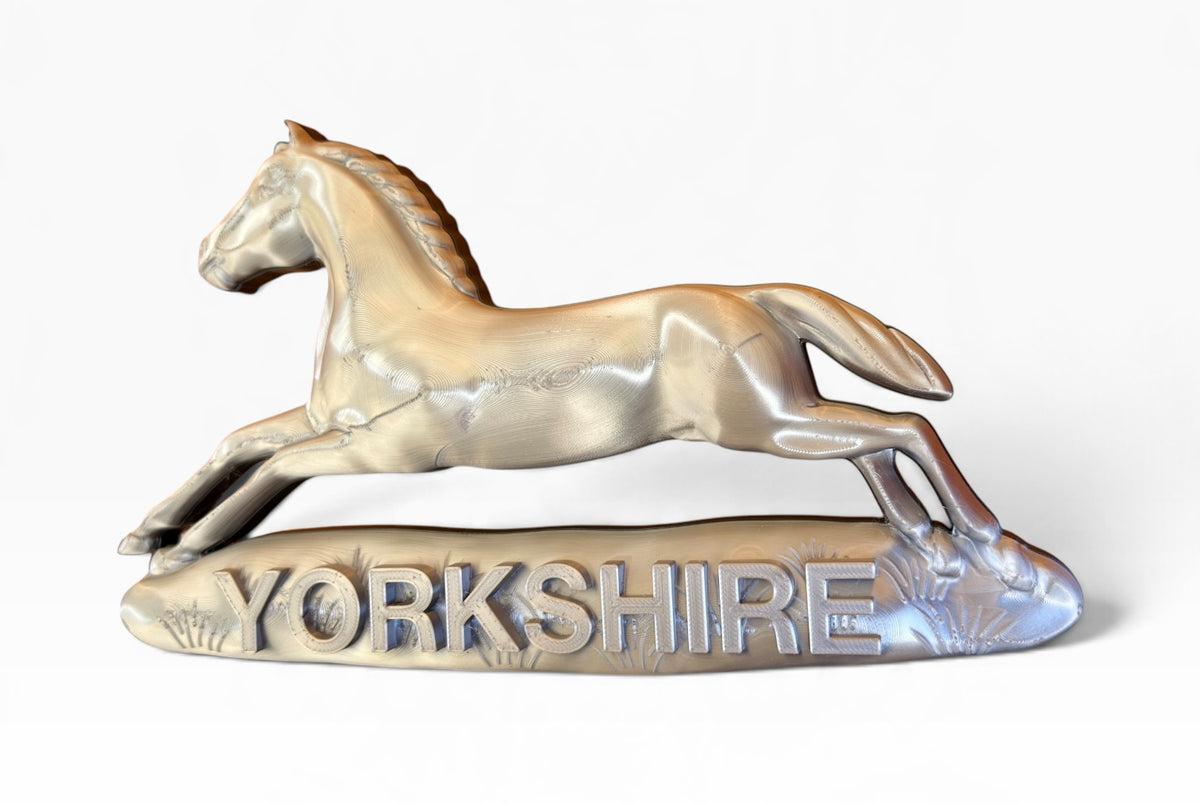 Yorkshire regimental emblem featuring silver badge detailing against a black base
