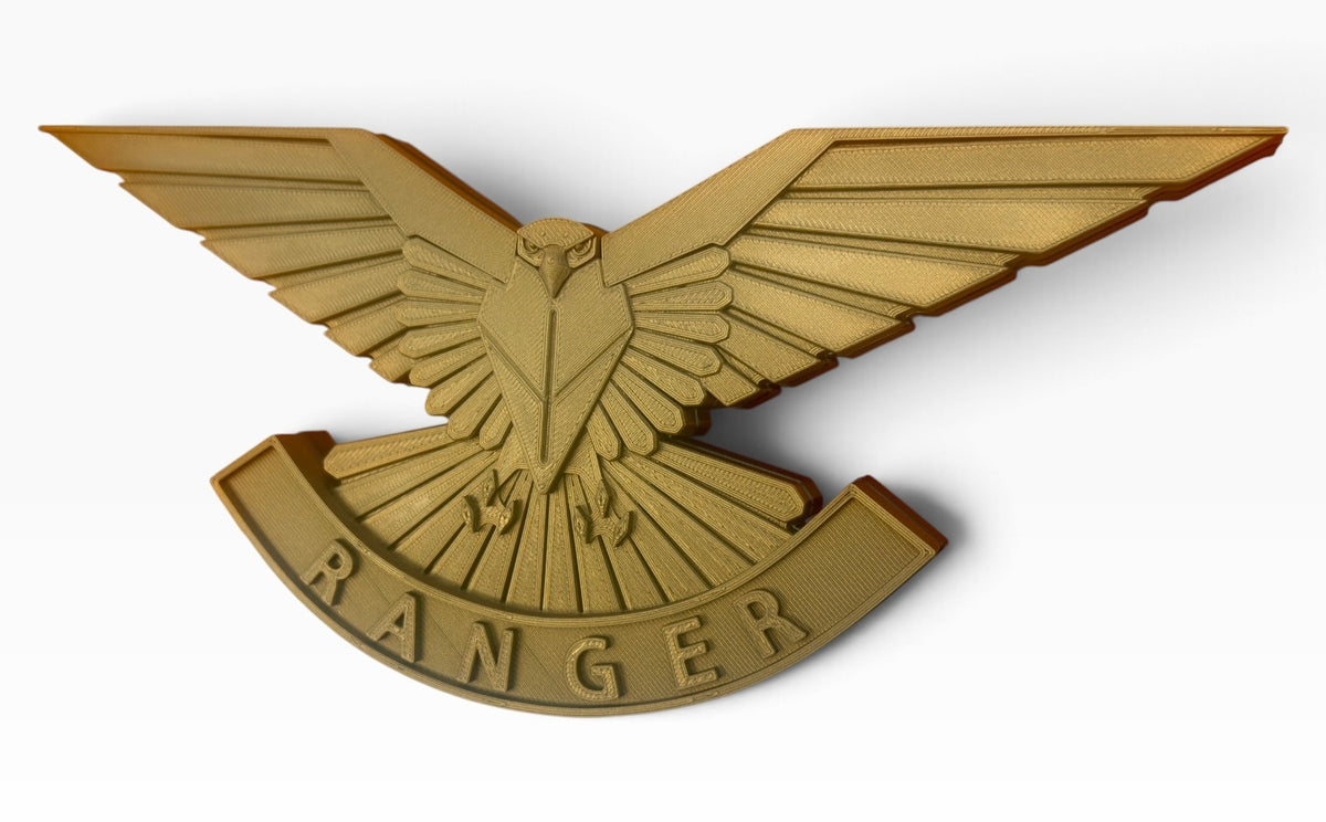 Angled front view of the Ranger Regiment display showing the fan-shaped tail, outstretched wings and raised RANGER lettering