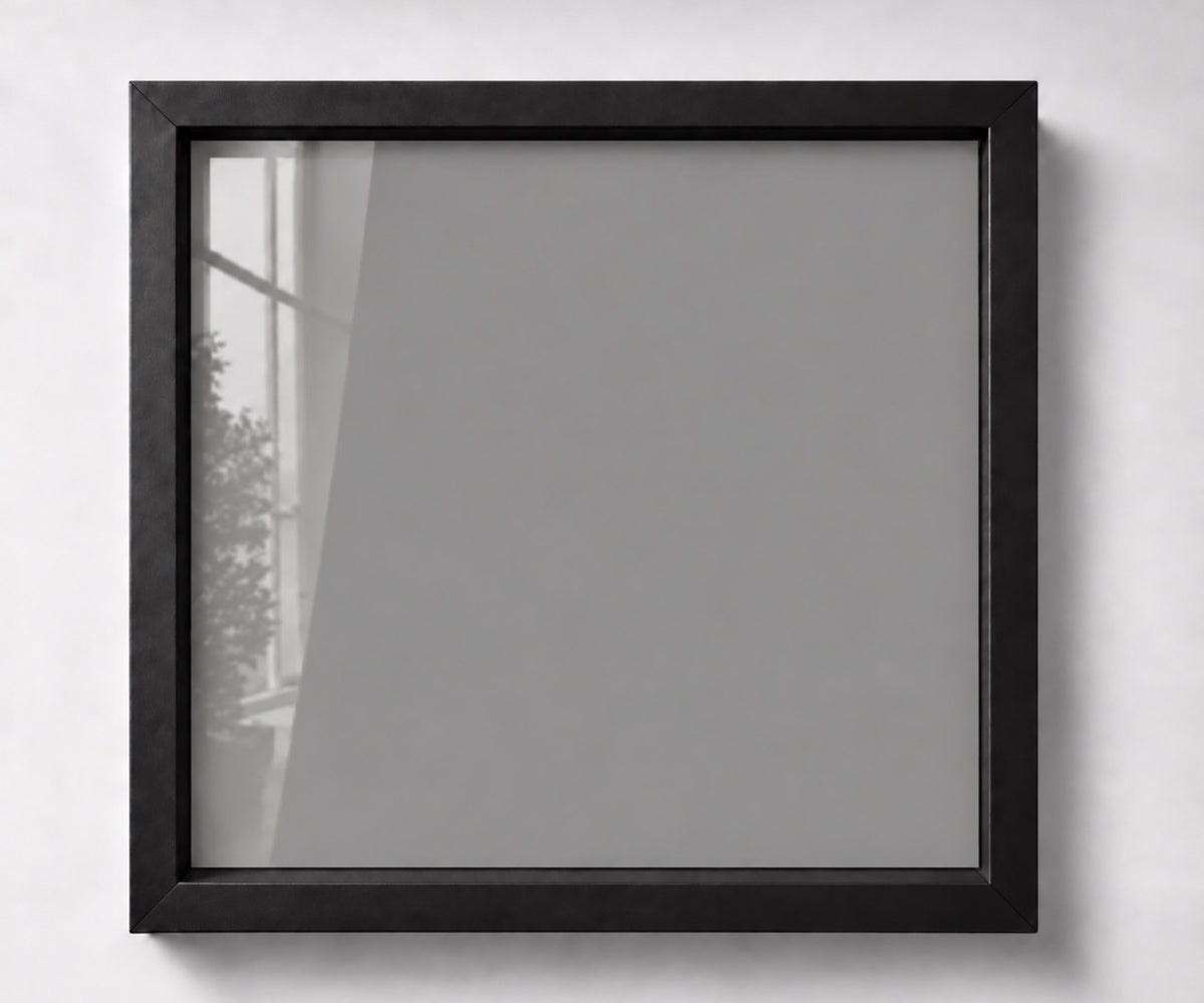 Black shadow-box frame showing the grey backing without the Ranger Regiment badge