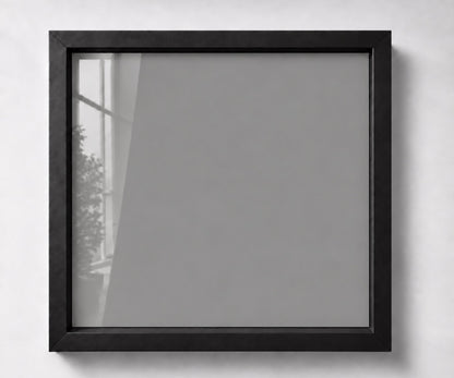 Black shadow-box frame showing the grey backing without the Ranger Regiment badge