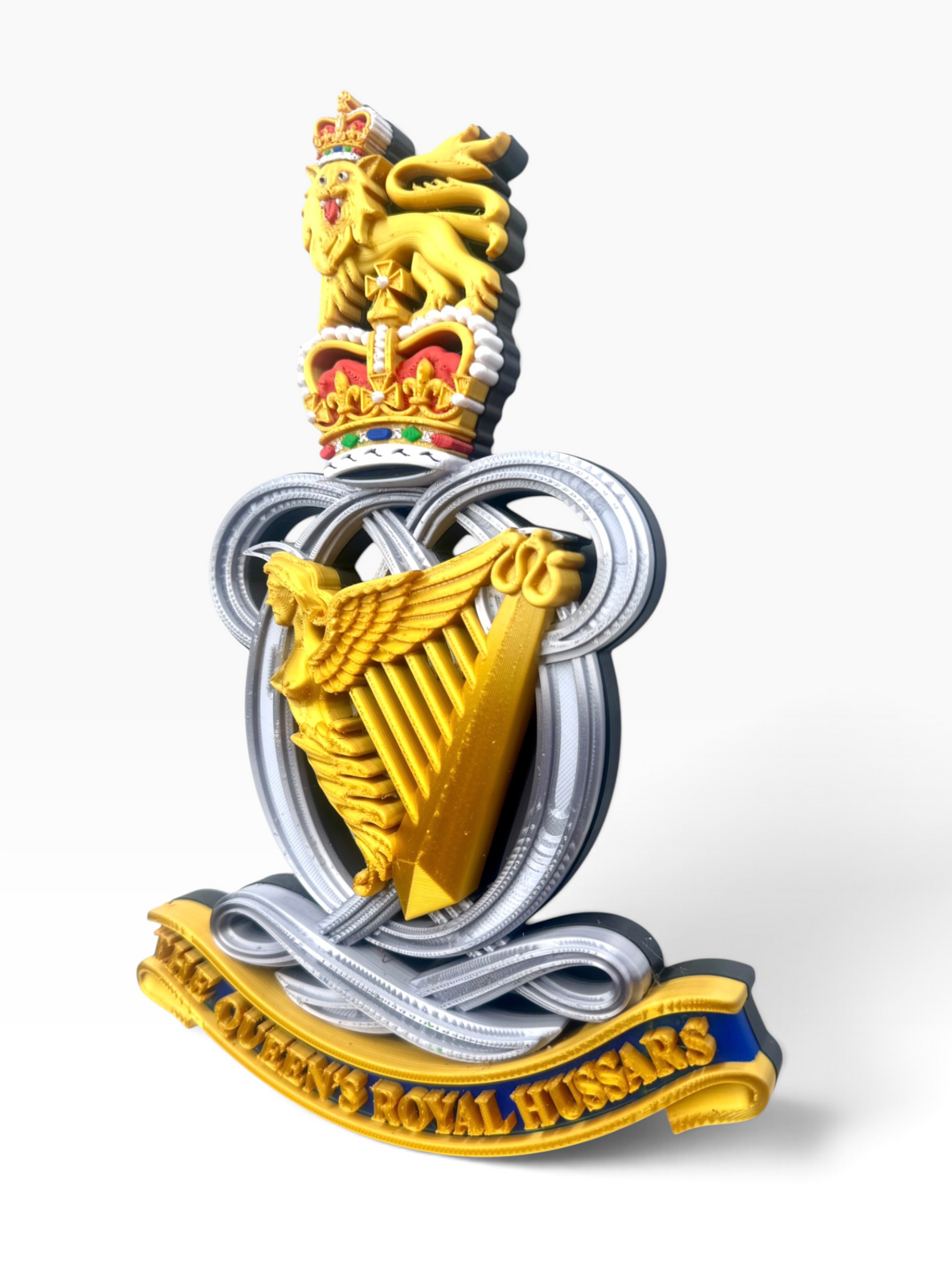 Queen’s Royal Hussars Queen’s Crown cap badge featuring the Angel Harp and regimental cypher