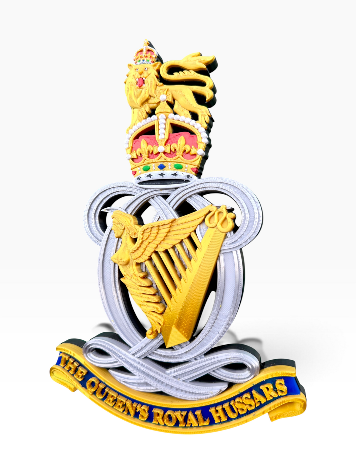 Detailed Queen’s Royal Hussars King’s Crown cap badge with the coloured regimental scroll